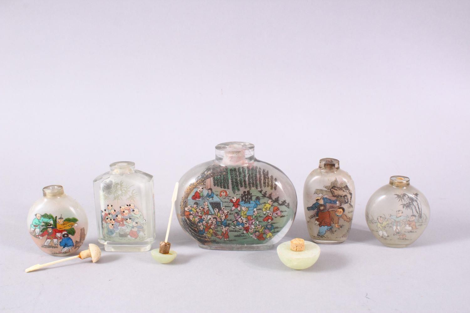 A MIXED LOT OF 5 CHINESE REVERSE PAINTED SNUFF BOTTLES, each with decoration of boys in - Image 5 of 9