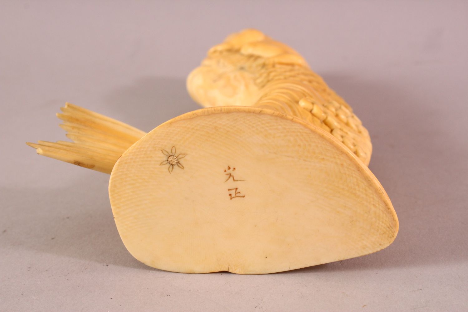 A JAPANESE MEIJI PERIOD CARVED IVORY FISH OKIMONO, the fish emerging from the water with a boy on - Image 8 of 9