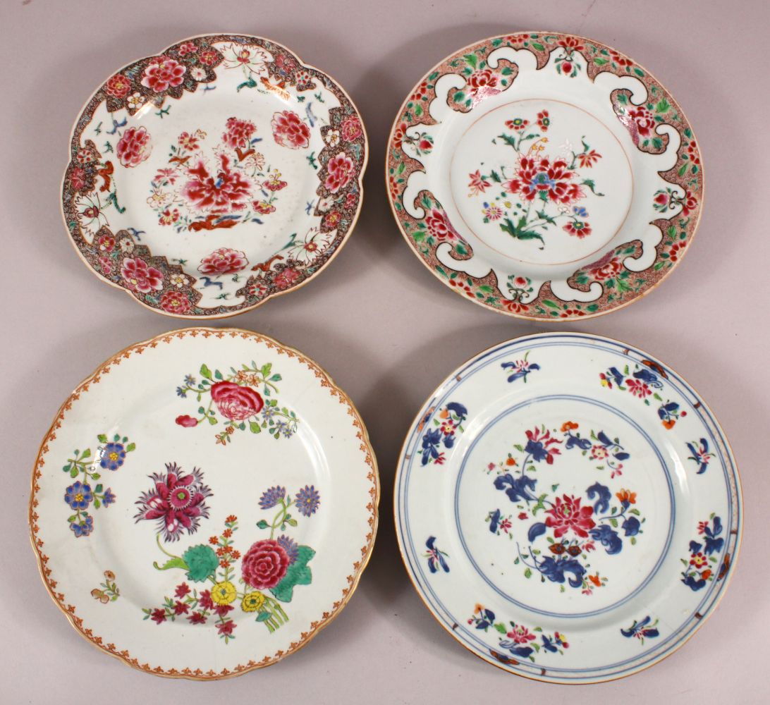 FOUR CHINESE 18TH CENTURY FAMILLE ROSE PORCELAIN PLATES, each with varying floral decoration, 23cm