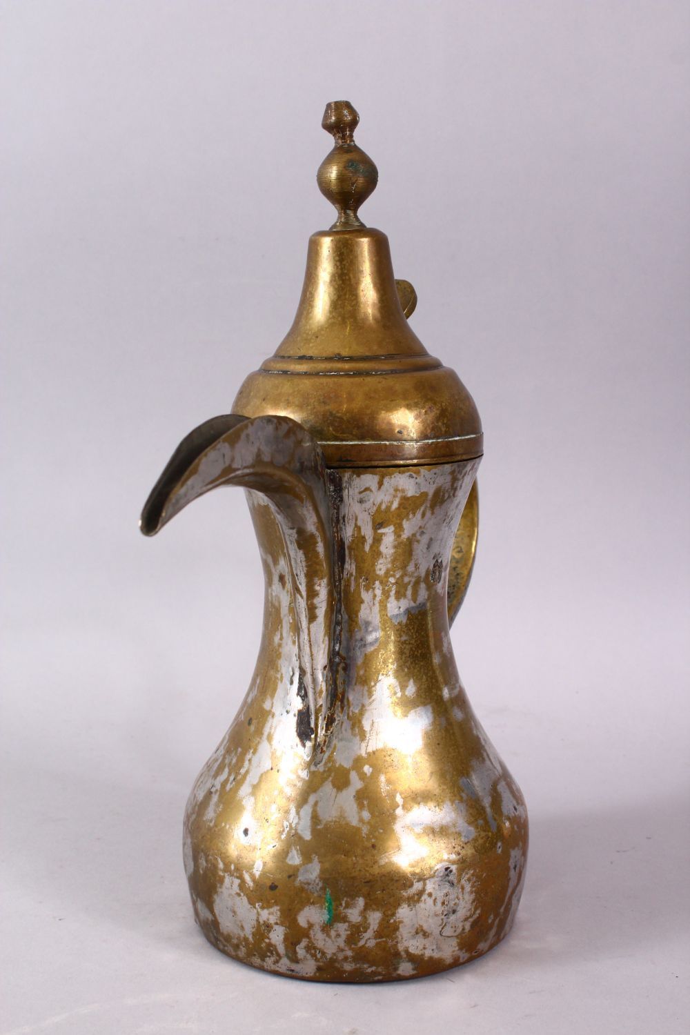 AN 19TH CENTURY ISLAMIC SILVERED BRASS SIGNED DALLAH / COFFEE POT, with an impressed signature to - Image 3 of 5