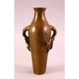 AN 18TH / 19TH CENTURY CHINESE BRONZE TWIN HANDLE VASE, the handles moulded in the form of prunus,