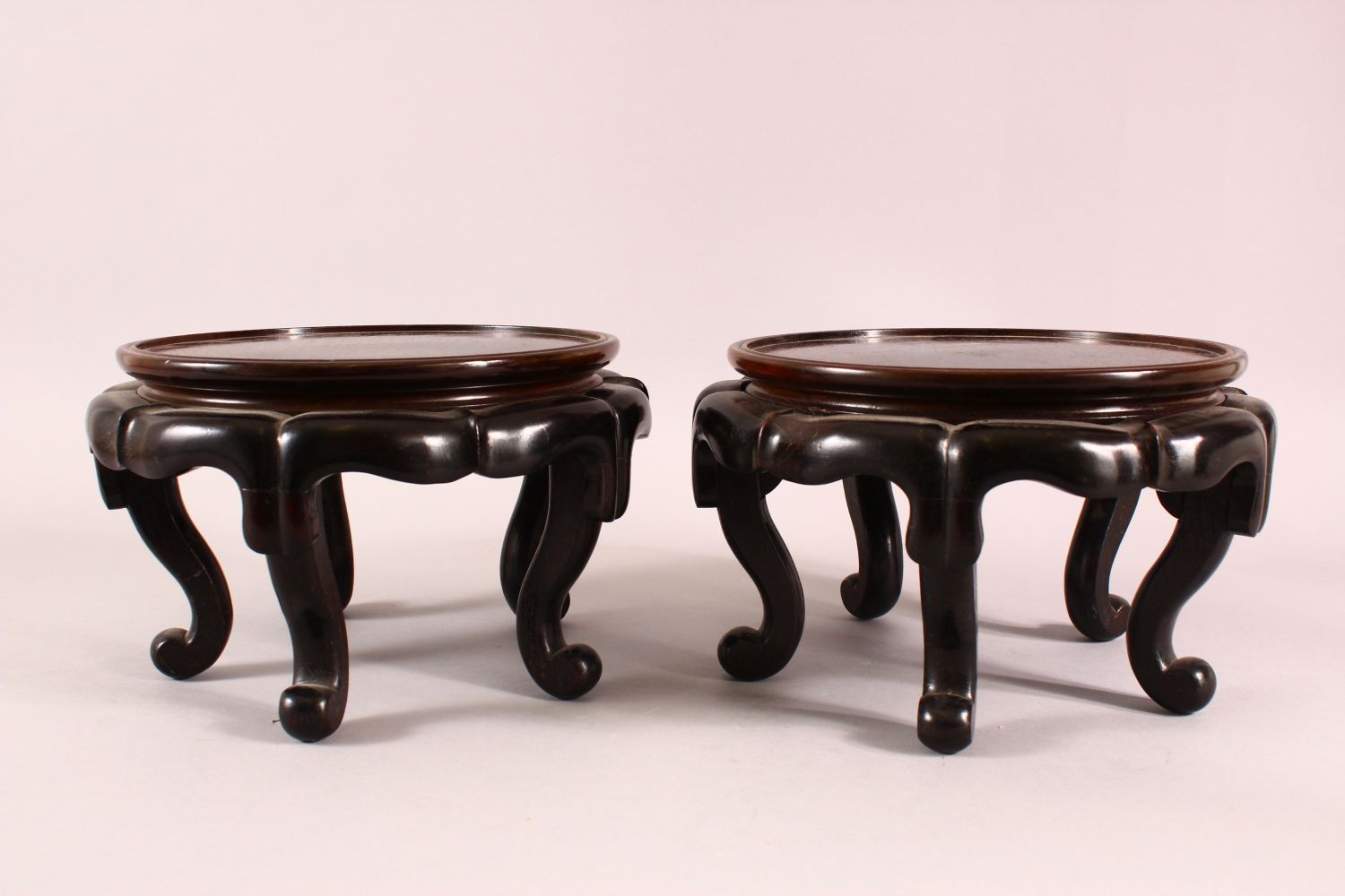 A PAIR OF 19TH CENTURY CHINESE CARVED HARDWOOD STANDS. each with five curving feet, 26cm wide - Image 3 of 4