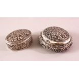 TWO 19TH CENTURY SRI LANKAN SILVER BOXES with filigree decoration, 7.5cm and 5.5cm wide.