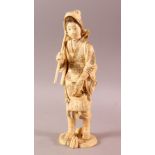 A LARGE JAPANESE MEIJI PERIOD CARVED IVORY OKIMONO - FARMER - the large okimono depicting a female