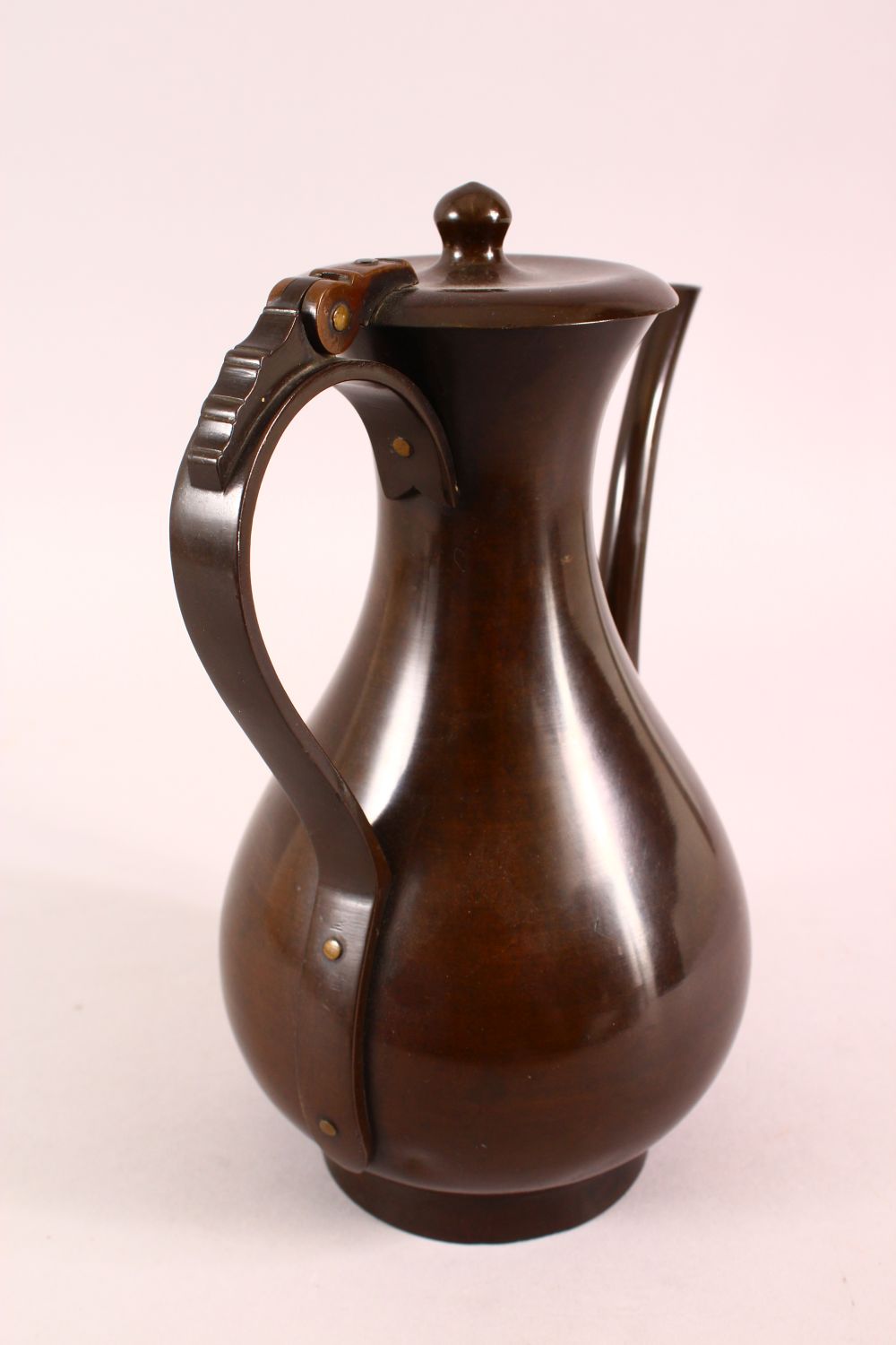 A JAPANESE MEIJI BRONZE TEMPLE EWER, used by monks with a hinged lid, and script to the base, 26cm - Image 3 of 5
