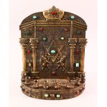 A GOOD JEWISH METAL CANDLESTICK HOLDER, with a star and twin lion decoration to the plate, with