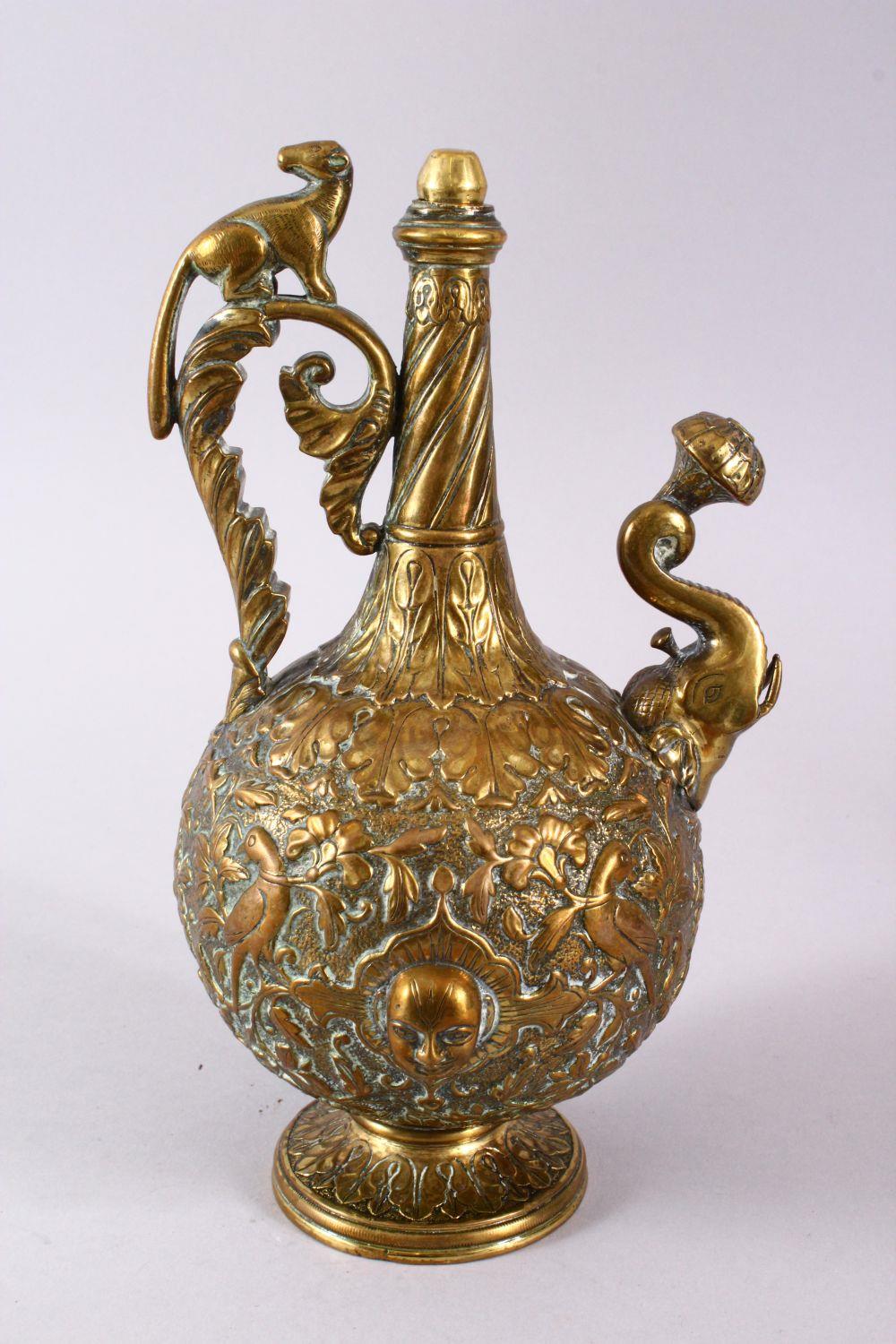 A 19TH CENTURY INDIAN SHIVA BRASS MOULDED EWER, with a stopper, the handle with an animal, the - Image 5 of 8