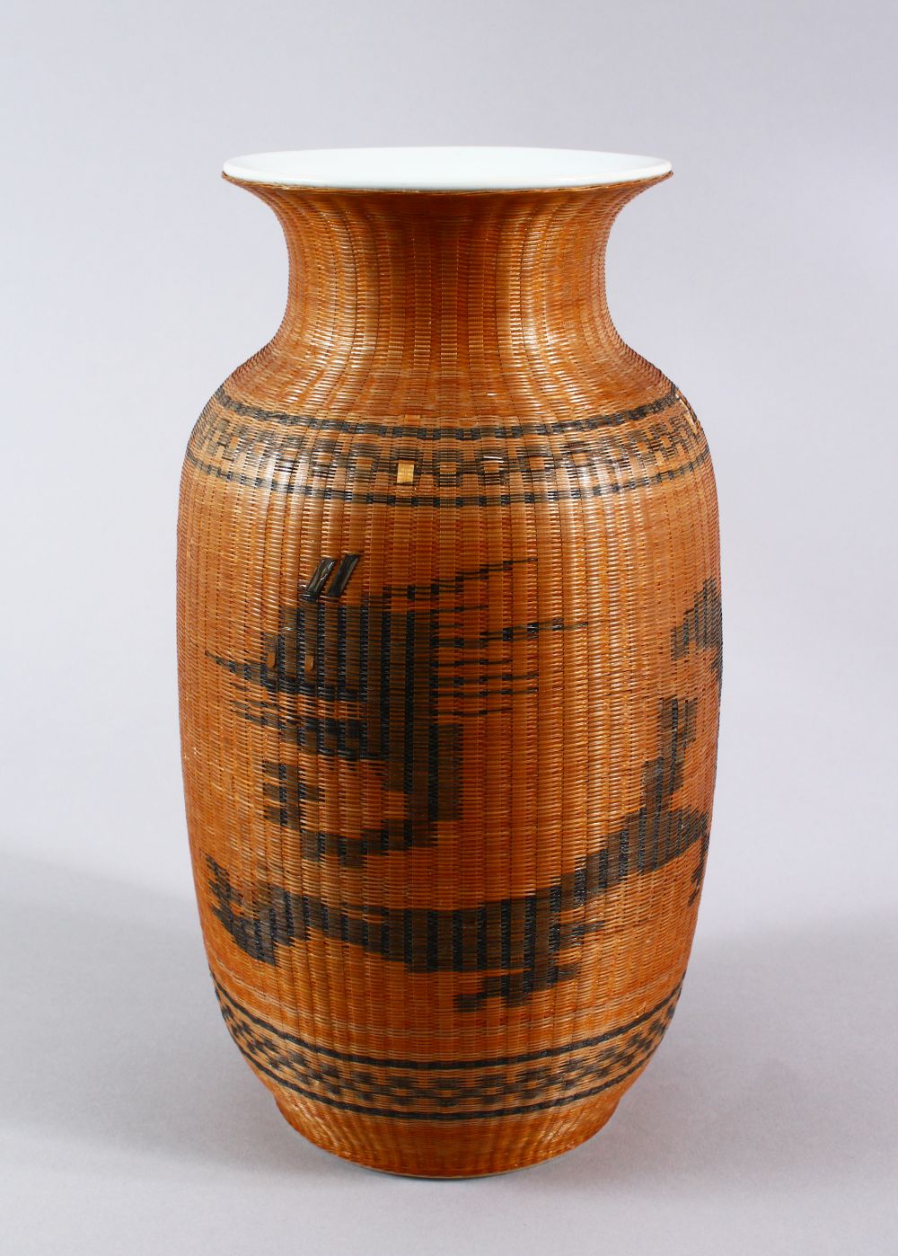 AN EARLY 20TH CENTURY CHINESE PORCELAIN VASE, with unusual bamboo decoration, 24.5cm high.