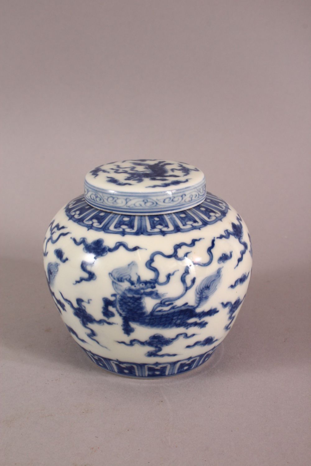 A CHINESE BLUE & WHITE PORCELAIN JAR & COVER, with decoration of kylin and clouds, base with a mark, - Image 2 of 7