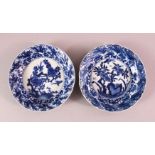A PAIR OF CHINESE KANGXI PERIOD BLUE & WHITE PORCELAIN SAUCER DISHES, each decorated with floral
