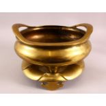 A LARGE BRONZE TWIN HANDLE BRONZE CENSER & STAND, the stand formed in lotus style, the censer with