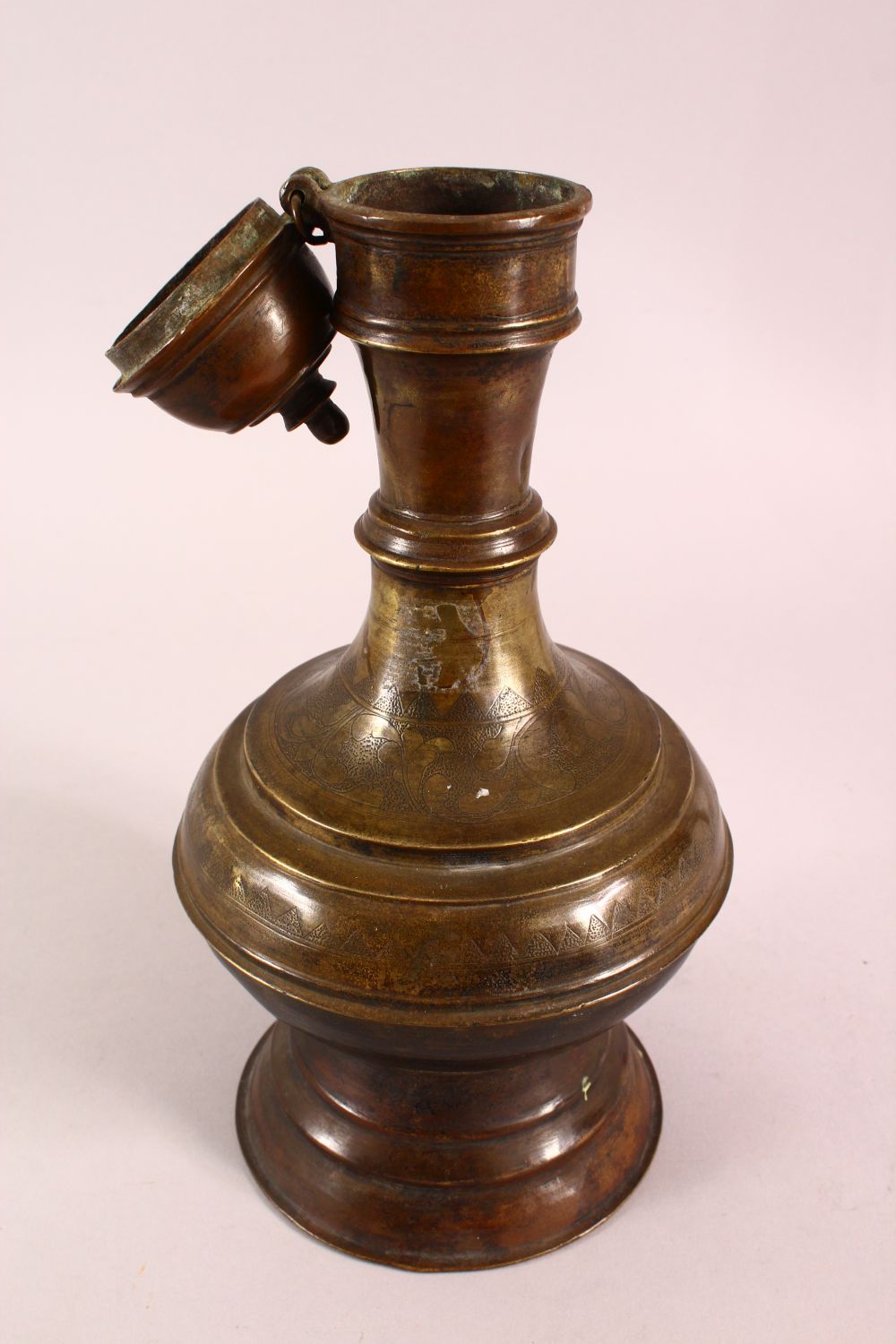 A 19TH CENTURY INDIAN BRONZE EWER, with chased floral decoration, 34cm - Image 2 of 5