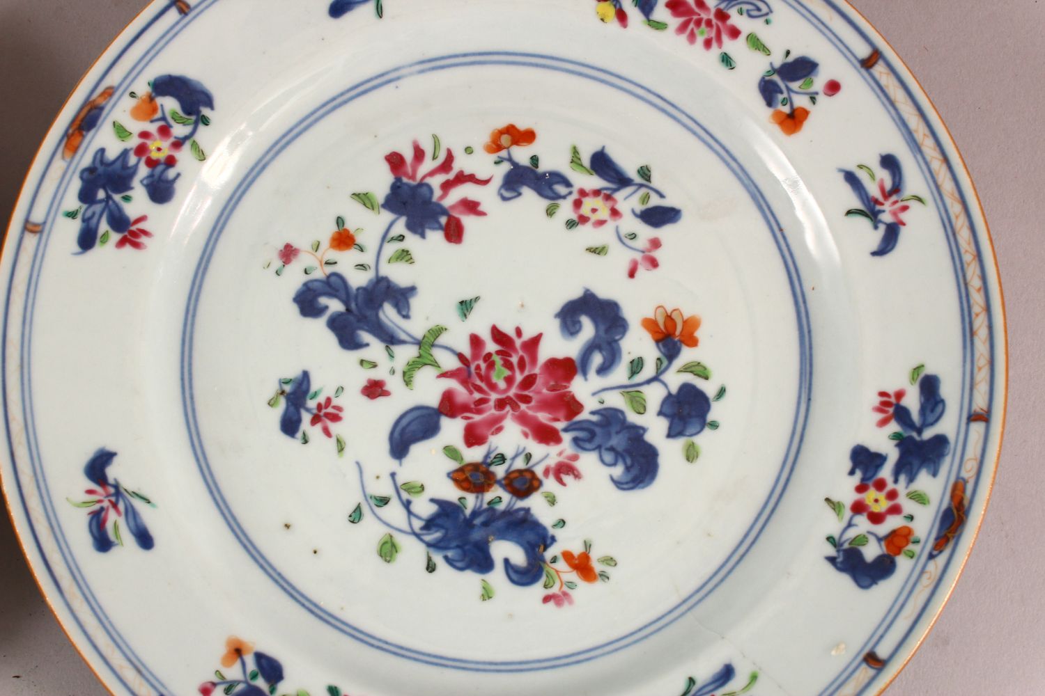 FOUR CHINESE 18TH CENTURY FAMILLE ROSE PORCELAIN PLATES, each with varying floral decoration, 23cm - Image 4 of 6