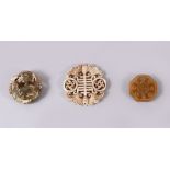 THREE CHINESE CARVED JADE PENDANTS, One carved in the form of TWIN BATS AND SYMBOLS, 6.5cm, one