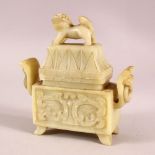 A CHINESE CARVED SOAPSTONE LIDDED CENSER, The body carved with twin handles and stylized bats, the