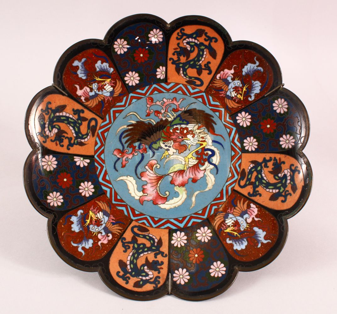 A CLOISONNE DISH OF LOBED FORM, the centre with phoenix on grey ground, 30cm diameter.