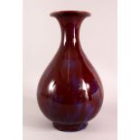 A CHINESE FLAMBE GLAZED PORCELAIN VASE, 35cm