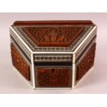 AN INDIAN CARVED WOOD & INLAID IVORY & EBONY LIDDED BOX, carved with figures and birds amongst