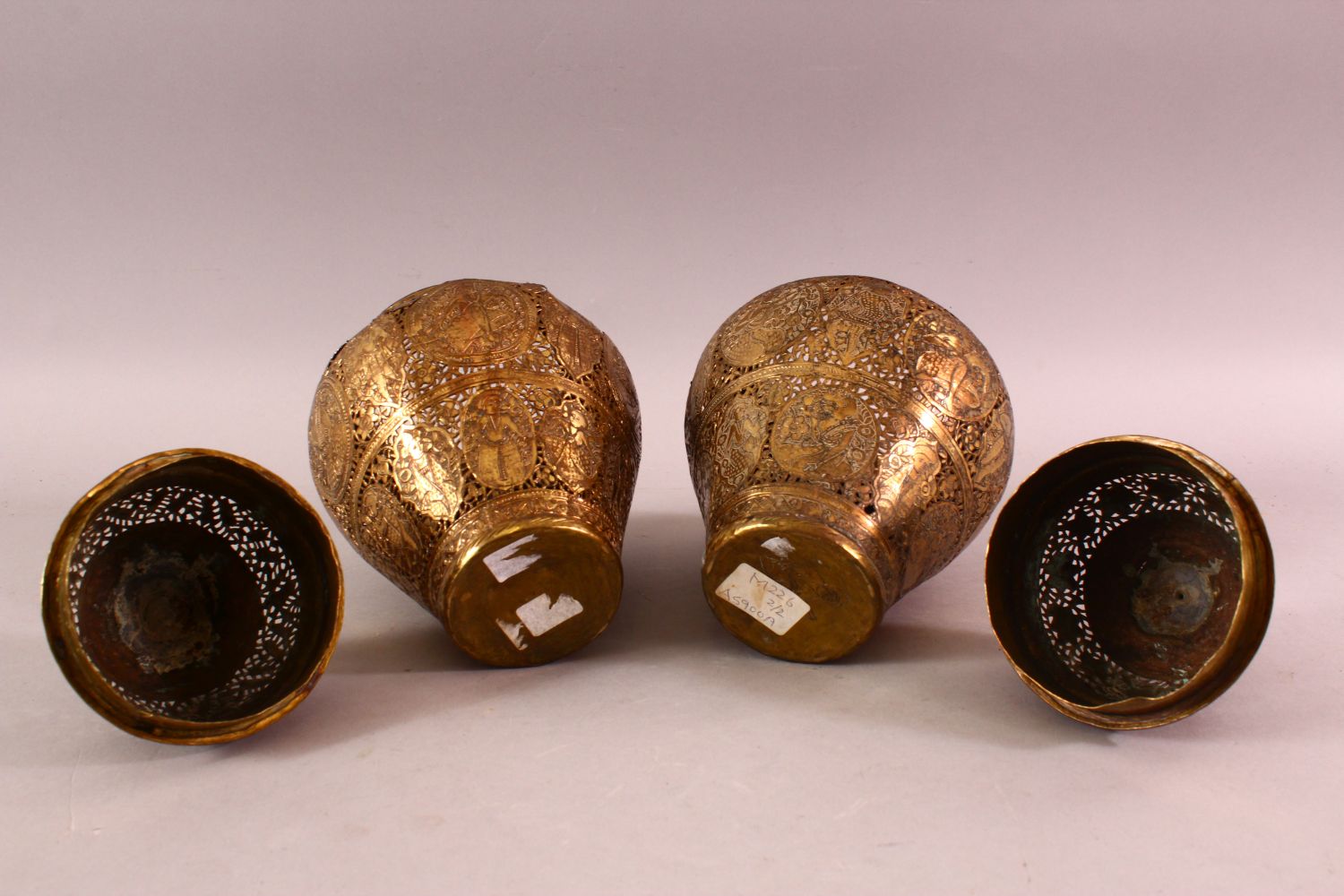 A PAIR OF QAJAR OPENWORK BRASS VASES & COVERS, with roundel figural decoration, 28cm - Image 7 of 7