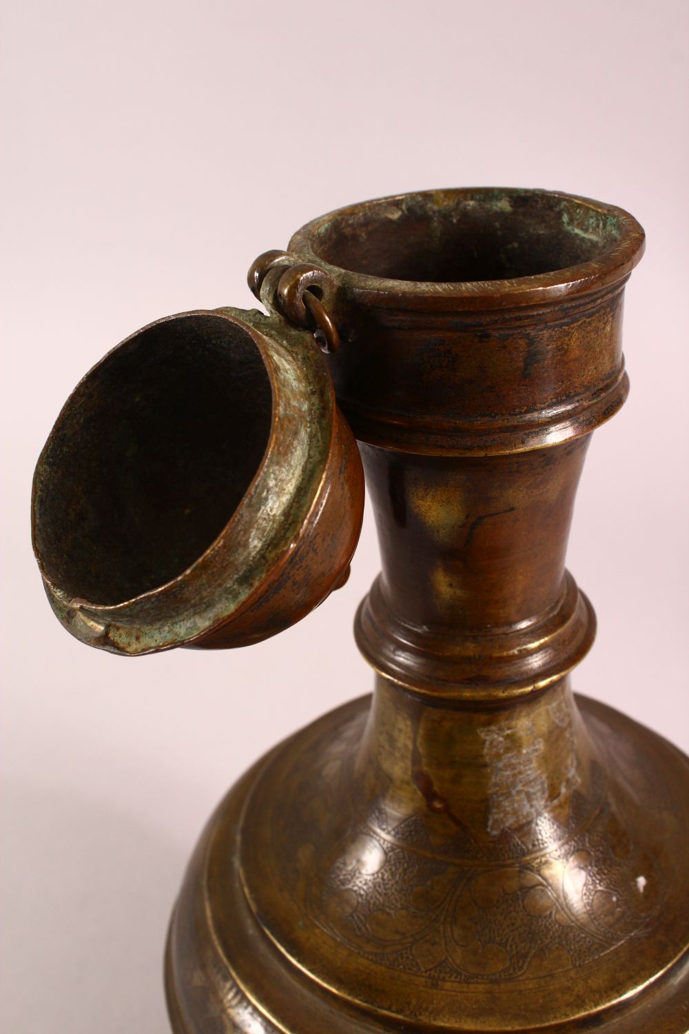 A 19TH CENTURY INDIAN BRONZE EWER, with chased floral decoration, 34cm - Image 3 of 5