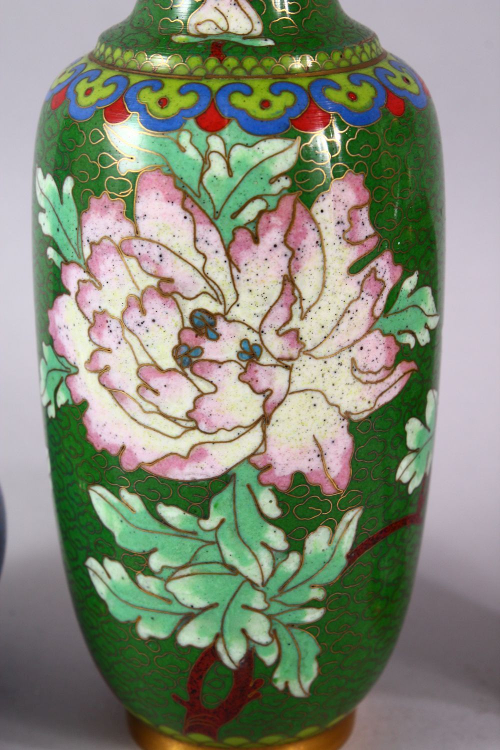 A MIXED LOT OF THREE CHINESE CLOISONNE VASES - the largest with a green ground with native Lotus - Image 3 of 8