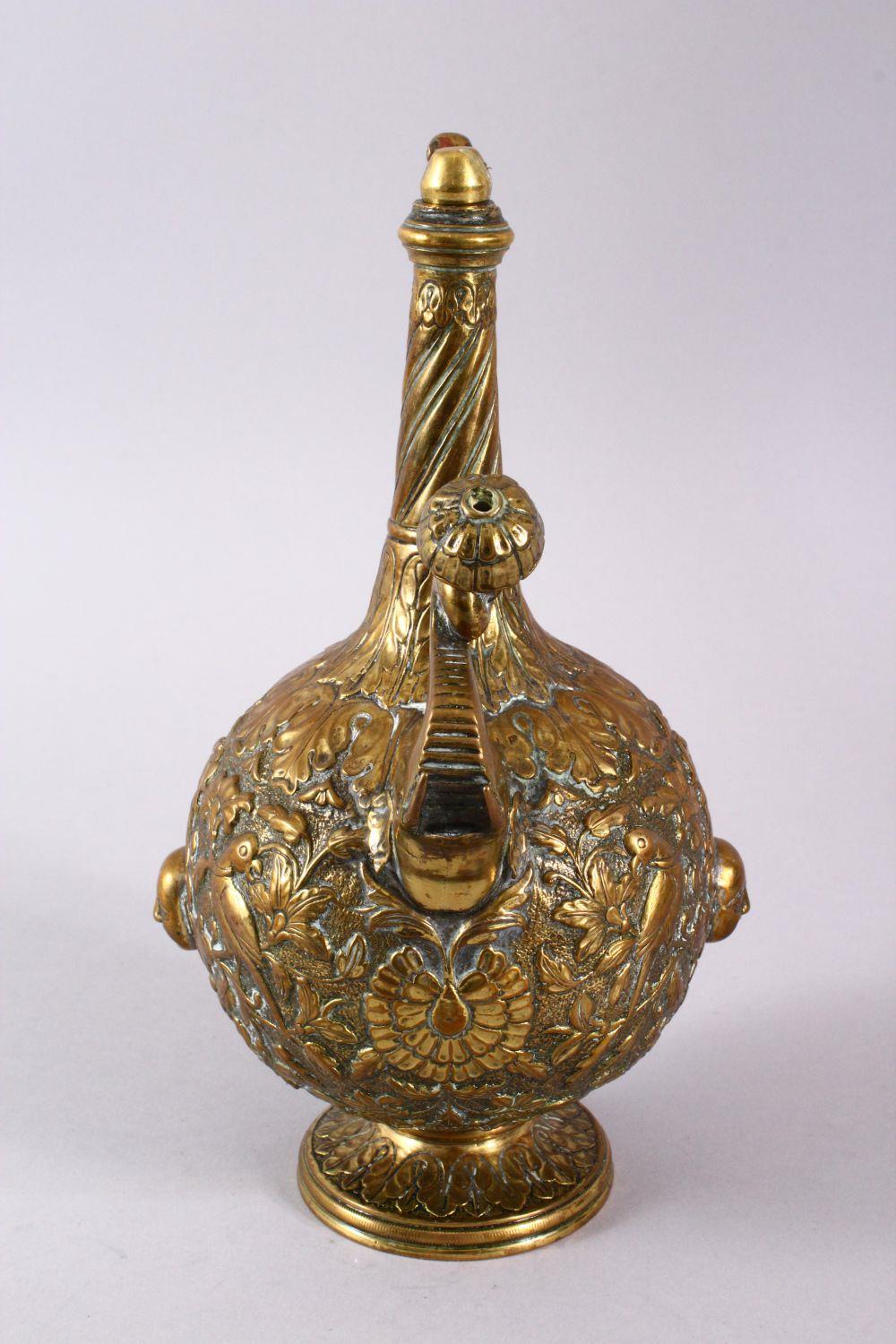 A 19TH CENTURY INDIAN SHIVA BRASS MOULDED EWER, with a stopper, the handle with an animal, the - Image 4 of 8
