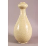 A CHINESE SONG / DING STYLE CARVED PORCELAIN VASE, with scraffito decoration, 34cm