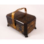 A JAPANESE LACQUER SEWING BOX, with a metal handle and floral gilt decoration, with lift up and o0ut