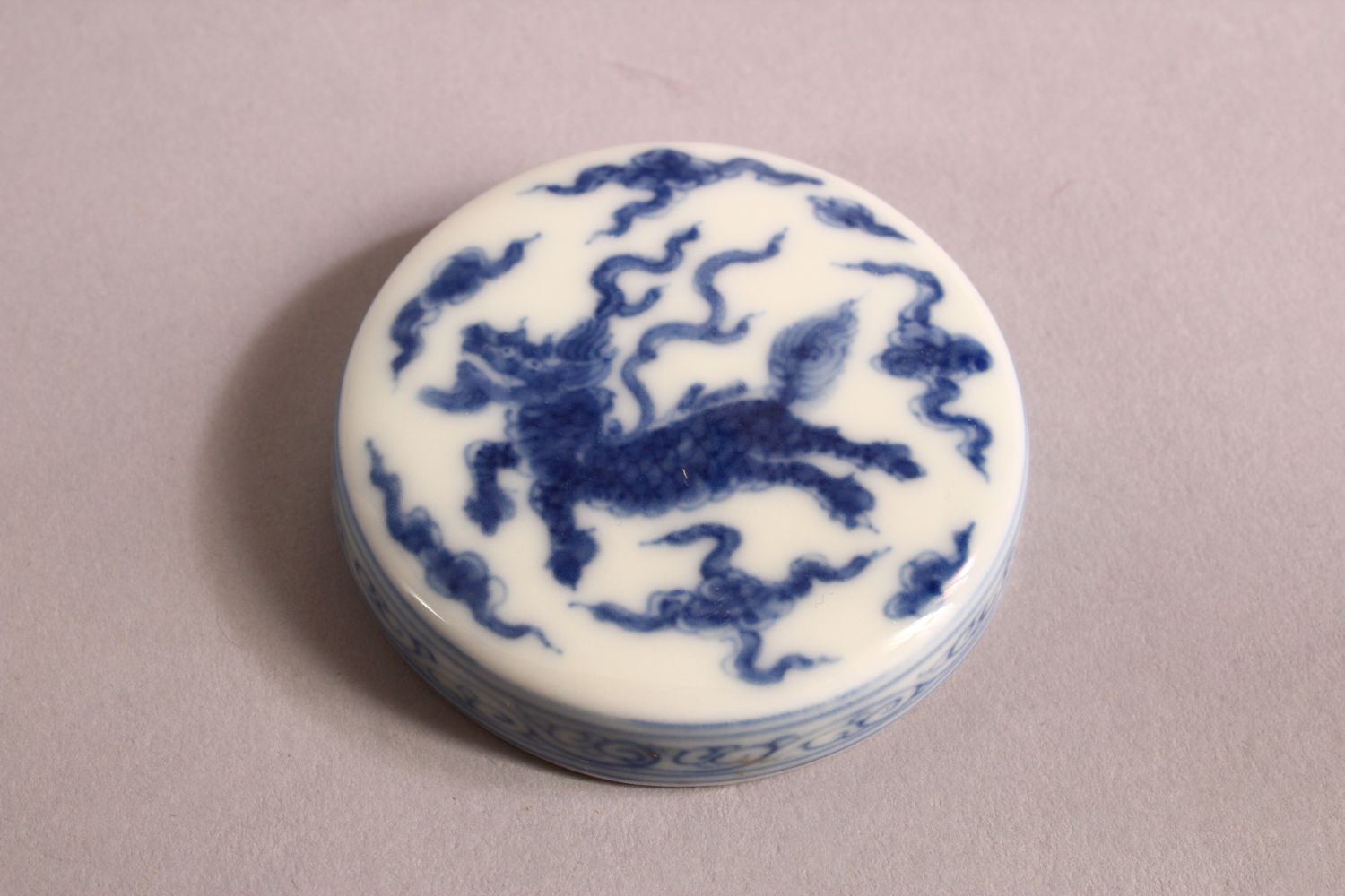 A CHINESE BLUE & WHITE PORCELAIN JAR & COVER, with decoration of kylin and clouds, base with a mark, - Image 6 of 7