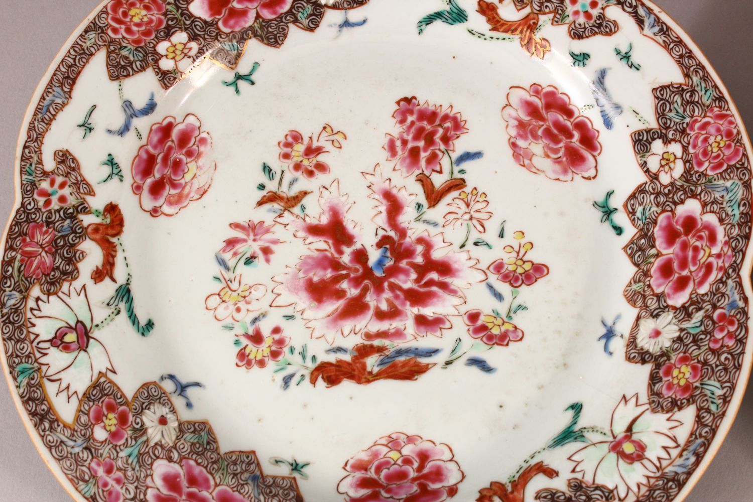 FOUR CHINESE 18TH CENTURY FAMILLE ROSE PORCELAIN PLATES, each with varying floral decoration, 23cm - Image 2 of 6