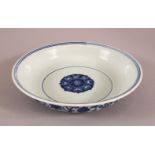 A CHINESE MING STYLE BLUE & WHITE PORCELAIN DISH, decorated with lotus, 20cm