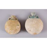 TWO 10TH CENTURY IRANAIN POTTERY TWIN HANDLE BOTTLES, each with traces of turquoise glaze to the