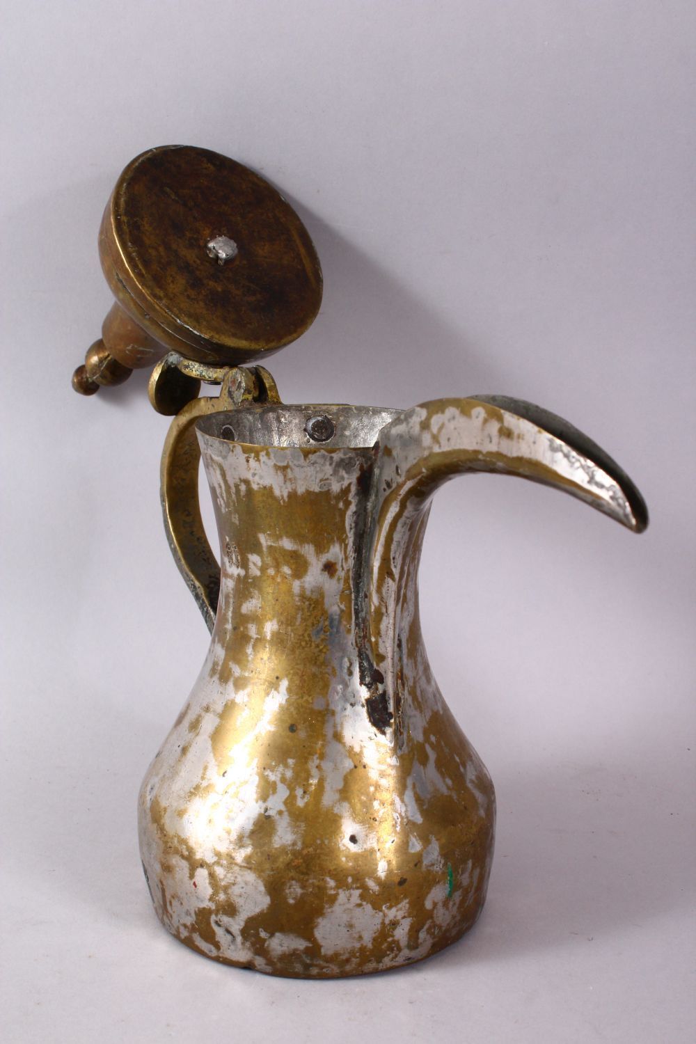 AN 19TH CENTURY ISLAMIC SILVERED BRASS SIGNED DALLAH / COFFEE POT, with an impressed signature to - Image 4 of 5