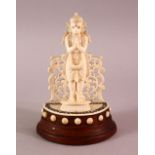 A 19TH CENTURY INDIAN CARVED IVORY VIZAGAPATUM FIGURE OF HANUMAN, 11cm high.