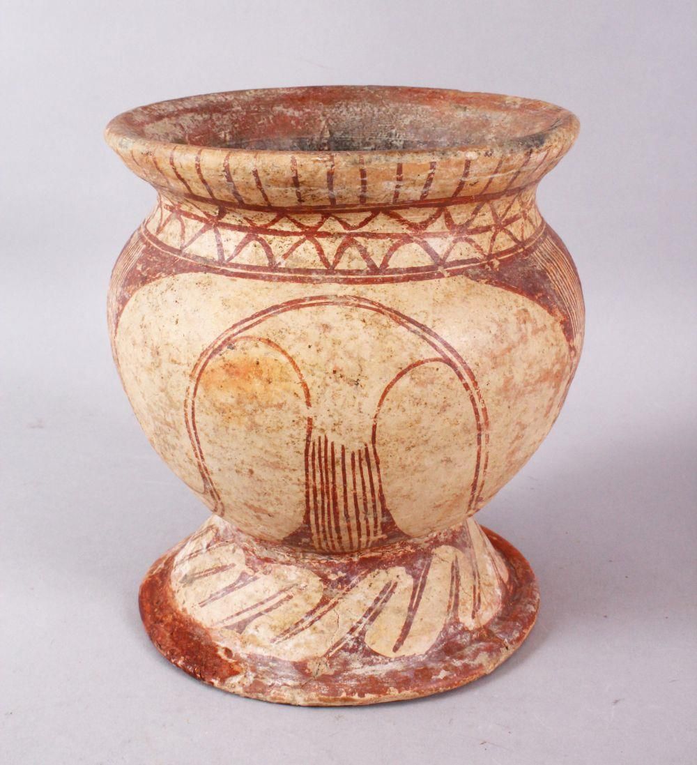 AN EARLY THAI BAN CHIANG POTTERY VASE, with stylized floral motif decoration, 15cm diameter x 16.5cm