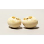 A PAIR OF SMALL CHINESE IVORY EGGS AND CHICKS, 1.5ins high.