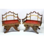 A PAIR OF 19TH/20TH CENTURY THAI CARVED HOWDAH ELEPHANT CHAIRS, profusely carved and pierced with