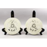 TWO 20TH CENTURY CHINESE CARVED HARDSTONE / JADELIKE BI - DISKS, each disk carved with phoenix birds