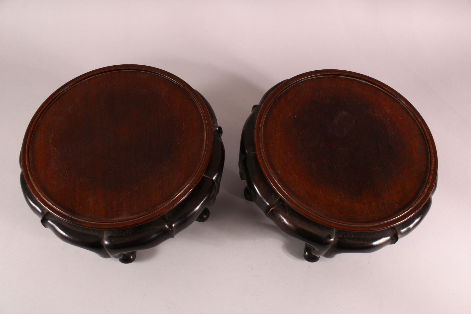 A PAIR OF 19TH CENTURY CHINESE CARVED HARDWOOD STANDS. each with five curving feet, 26cm wide - Image 2 of 4