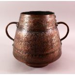A 19TH CENTURY ISLAMIC COPPERED BRONZE TWIN HANDLE POT, with carved motif decoration to the body and