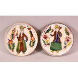 A PAIR OF OTTOMAN KUTAHYA POTTERY PLATES, each decorated with figures, 12cm