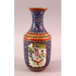A CHINESE FAMILLE ROSE PORCELAIN VASE, with panels of figures and floral decoration, the base with a