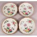 A SET OF FOUR 18TH / 19TH CENTURY CHINESE FAMILLE ROSE PLATES, with floral decoration, 23cm