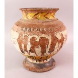 AN EARLY EGYPTIAN OR EASTEN POLYCHROME DECORATED POTTERY VASE, with traces of figural decoration,