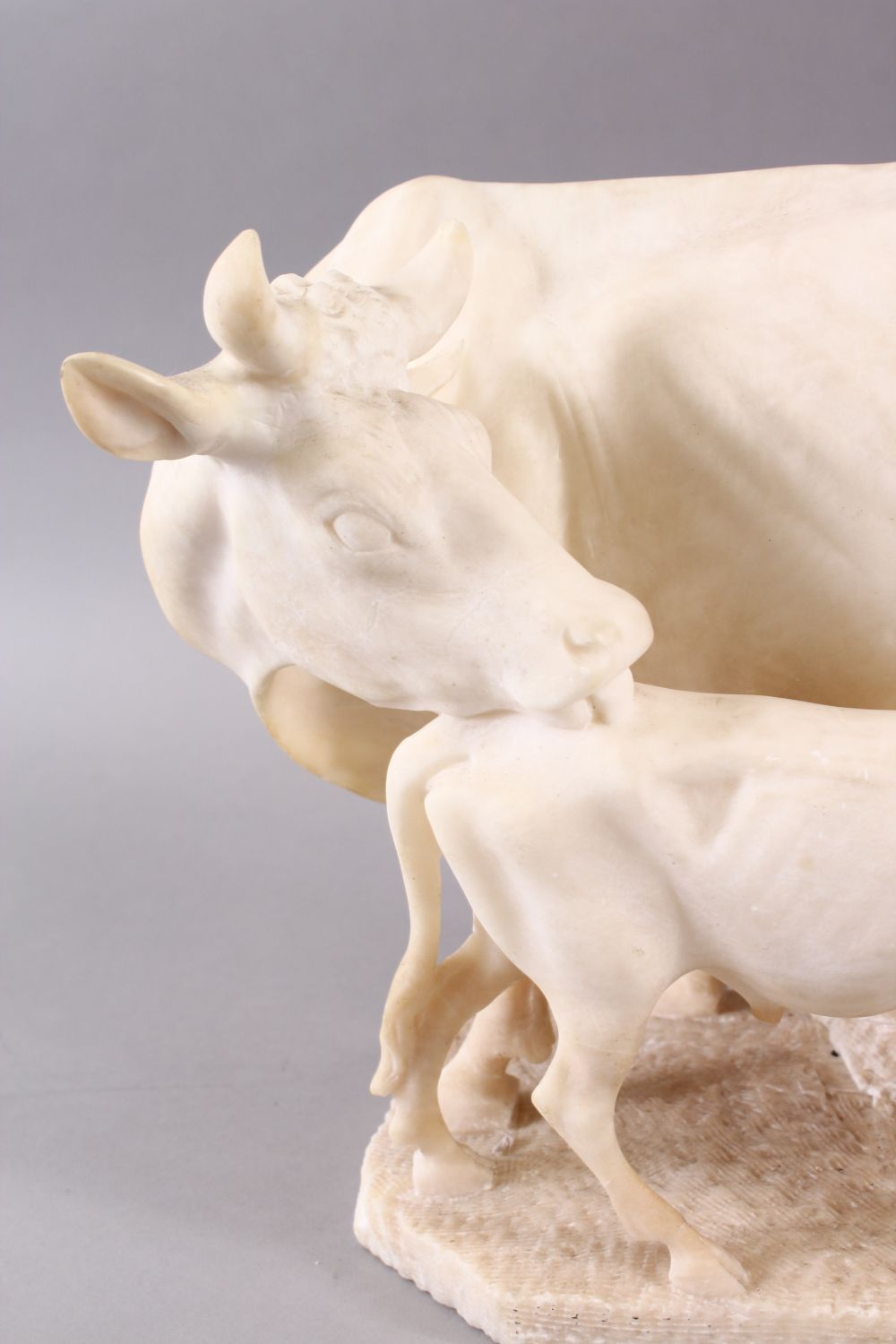 A 19TH CENTURY INDIAN ALABASTER MODEL OF NANDI COWS - the larger cow depicted with young, 25cm - Image 2 of 6