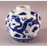 A 19TH CENTURY CHINESE BLUE & WHITE PORCELAIN DRAGON VASE, decorated with dragons, clouds and