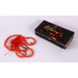 A SET OF CARVED CORAL RELIGEOUS PRAYER BEAD & INLAID IVORY TORTOISESHELL BOX, the red coral prayer