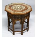 A GOOD MOORISH BONE INLAID OCTAGONAL TABLE with folding base, 62cm diameter, 62cm high.
