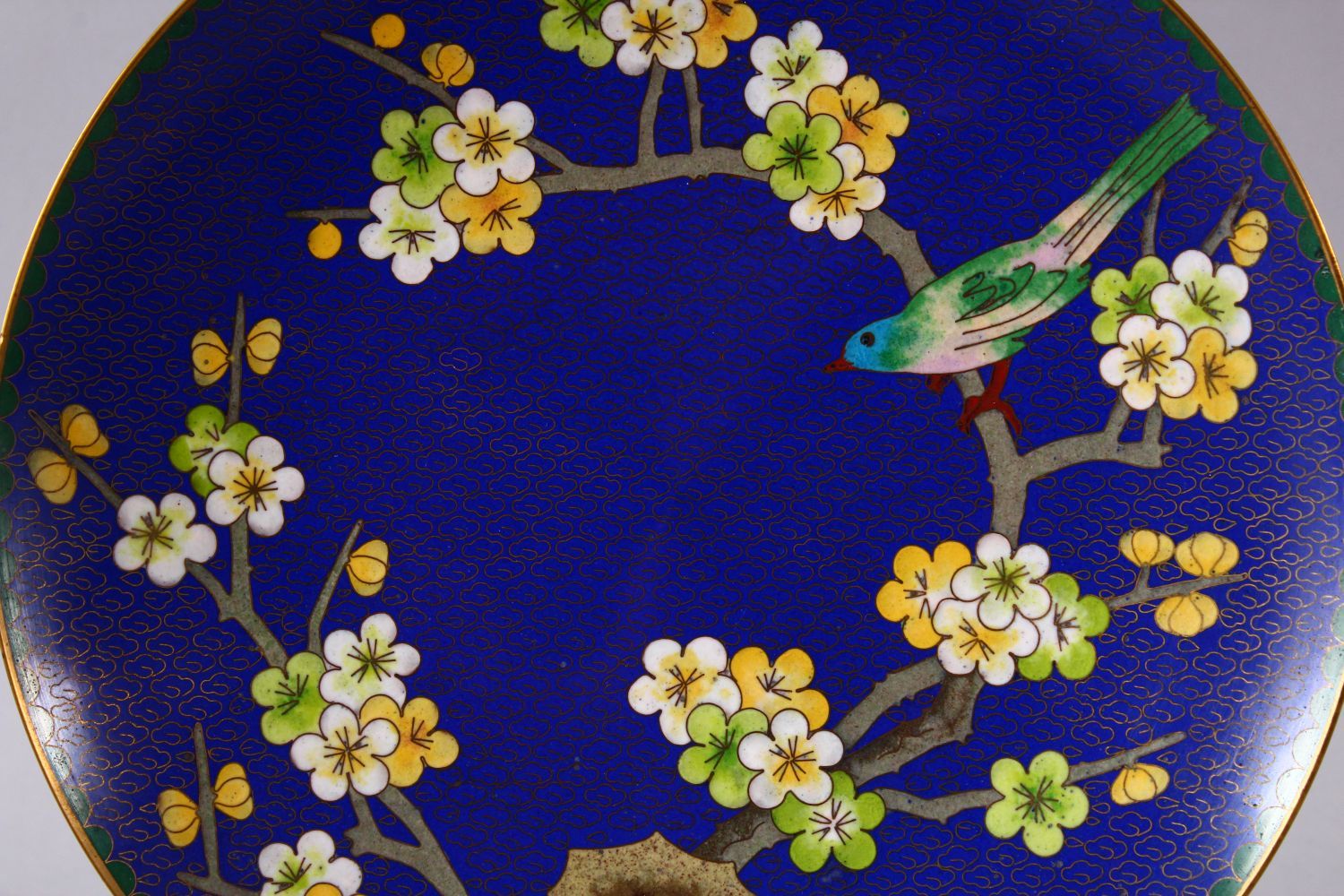 A CHINESE CLOISONNE PLATE & STAND - the dish with a royal blue ground with prunus decoration, 23cm. - Image 2 of 6