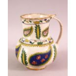 AN OTTOMAN KUTAHYA POTTERY JUG, with floral motif decoration, 12cm